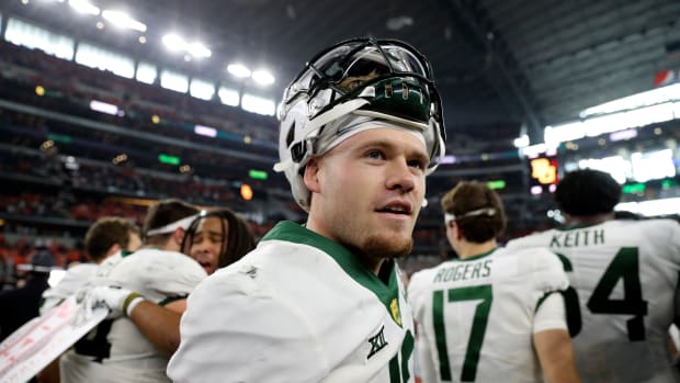 Dec 4, 2021; Arlington, TX, USA; Baylor Bears quarterback Blake Shapen (12) celebrates the victory against the Oklahoma State Cowboys after the Big 12 Conference championship game at AT&T Stadium. Mandatory Credit: Kevin Jairaj-USA TODAY Sports